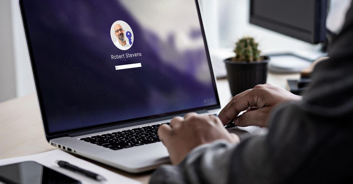 person logging into a computer